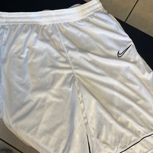 Mens white Nike athletic shirt.